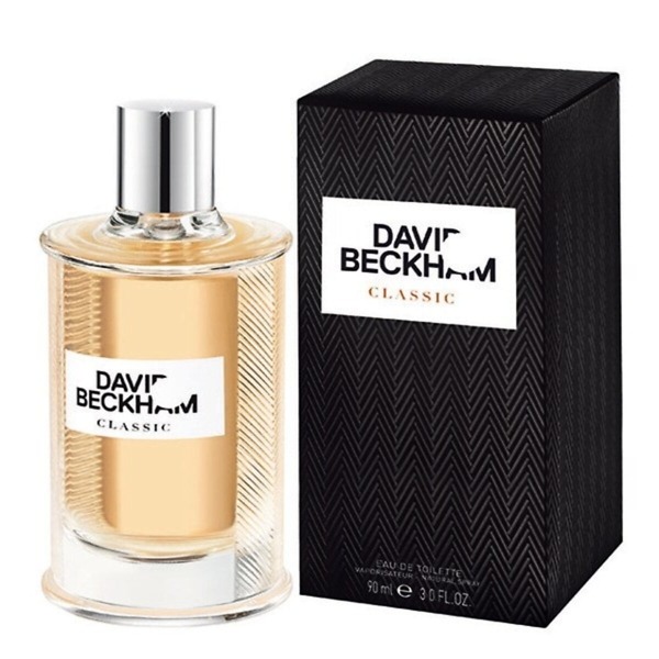 A 90ml bottle of David Beckham Classic Eau de Toilette, featuring a sleek glass design with a textured silver cap, reflecting the sophisticated and woody fragrance ideal for modern men.