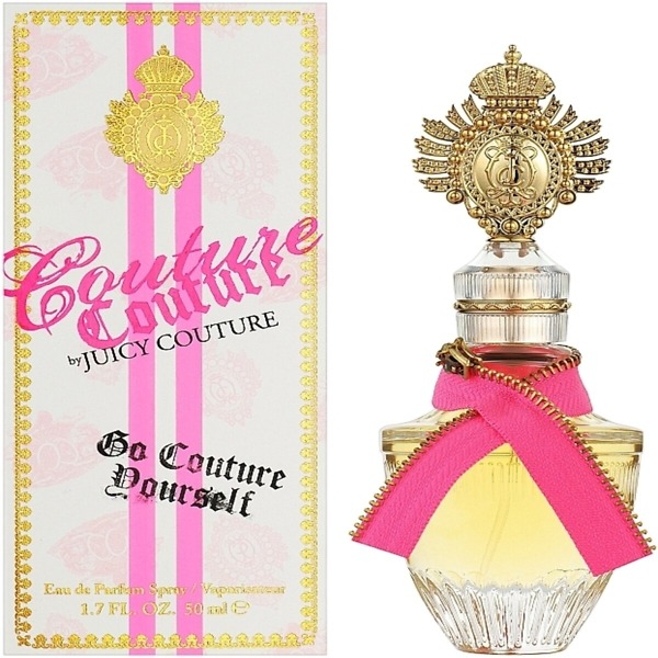 A 50ml bottle of Juicy Couture Couture Eau De Parfum Spray, featuring a luxurious and playful design with a gold-accented cap and pink detailing. The bottle reflects the bold and glamorous floral-fruity fragrance, perfect for confident and stylish women.